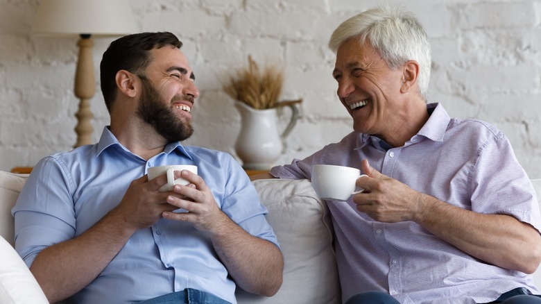 dad and adult son talking