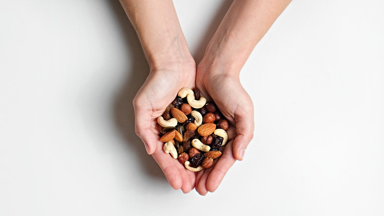 Trail mix in hands