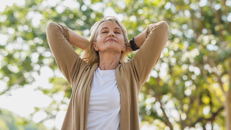 Woman breathing in air