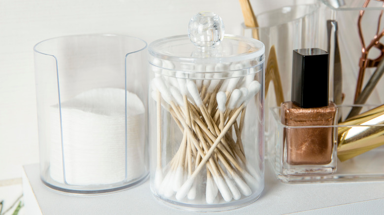 cotton swabs, cleansing pads, nail polish