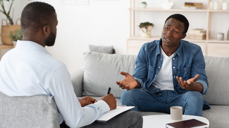 black man talking to a black psychologist