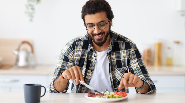 man eating dinner