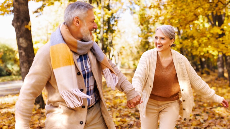 senior couple walking outside