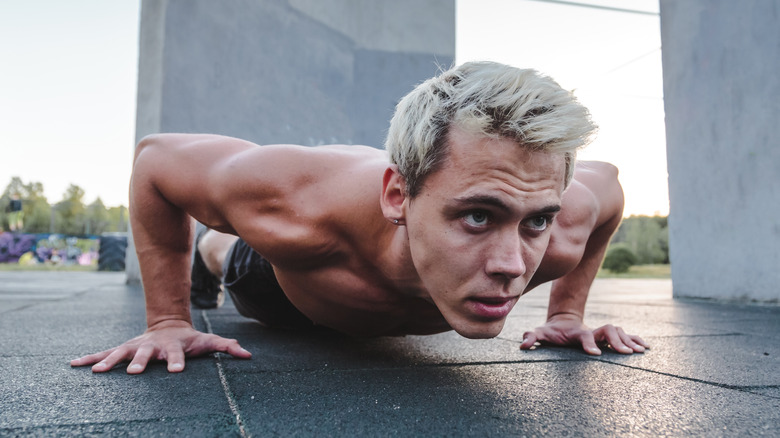 Fit man doing a push-up