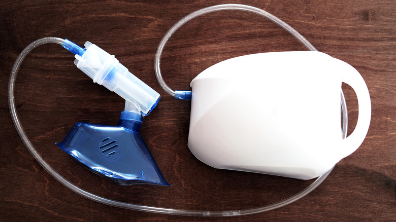 Nebulizer and face mask attachment