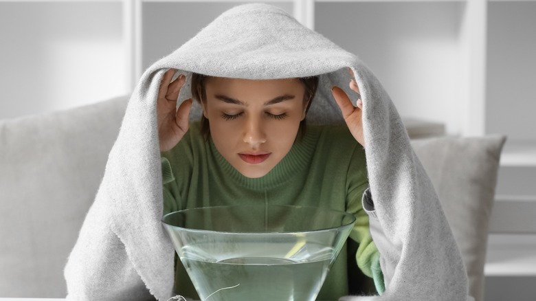 woman doing steam inhalation