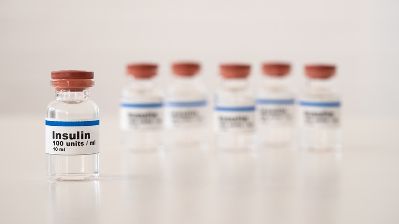 insulin bottles on table