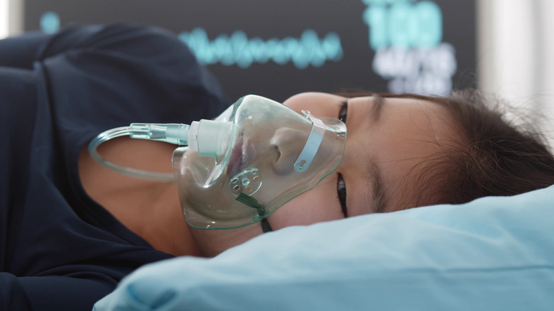 asian girl with cystic fibrosis in hospital