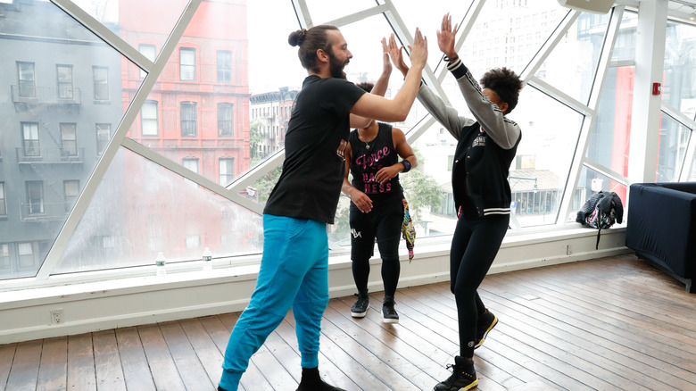 Jonathan Van Ness giving high five