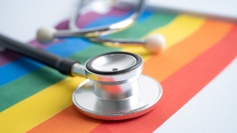 Stethoscope with a rainbow background