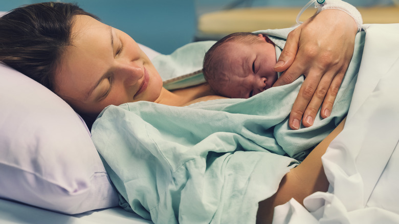 Woman holding her newborn