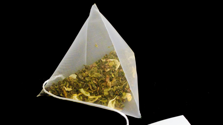 Triangular pyramid bag with green tea