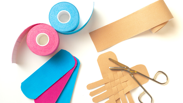 different colors of kinesiology tape strips and rolls