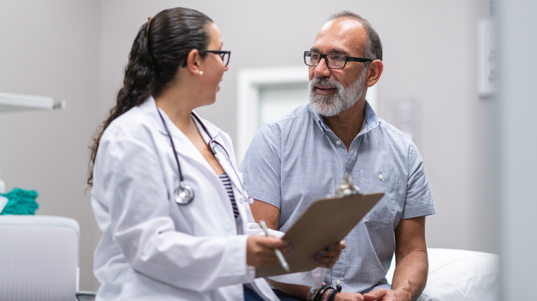 Patient talking to doctor