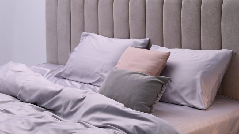Bed with satin pillowcases