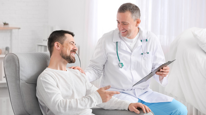 Chemotherapy patient with doctor