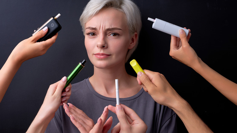 Young woman saying no to vaping