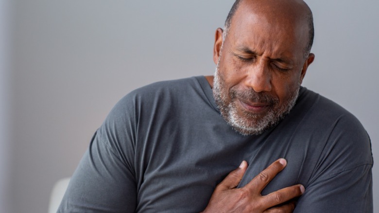man having chest pain