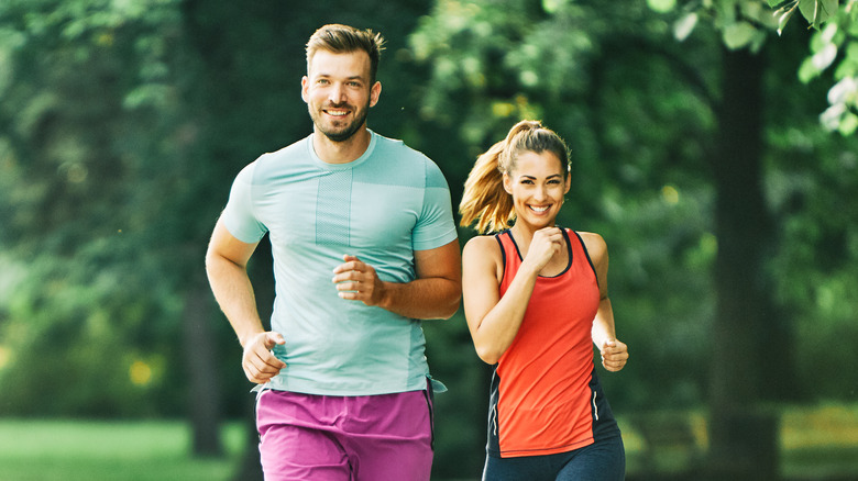 young couple enjoying jogging outdoors