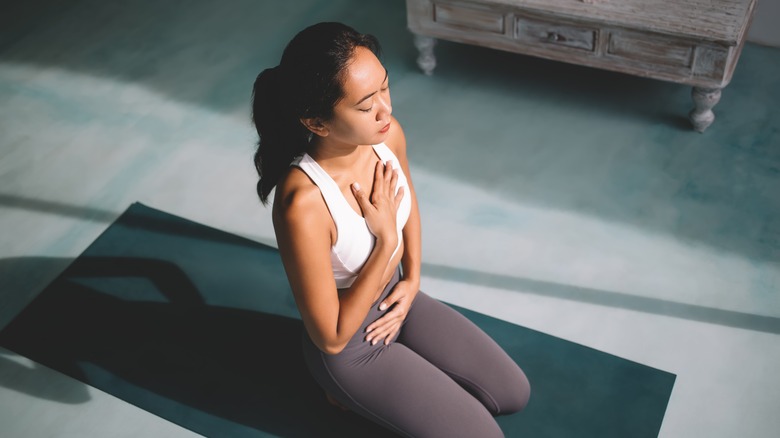 woman doing yoga