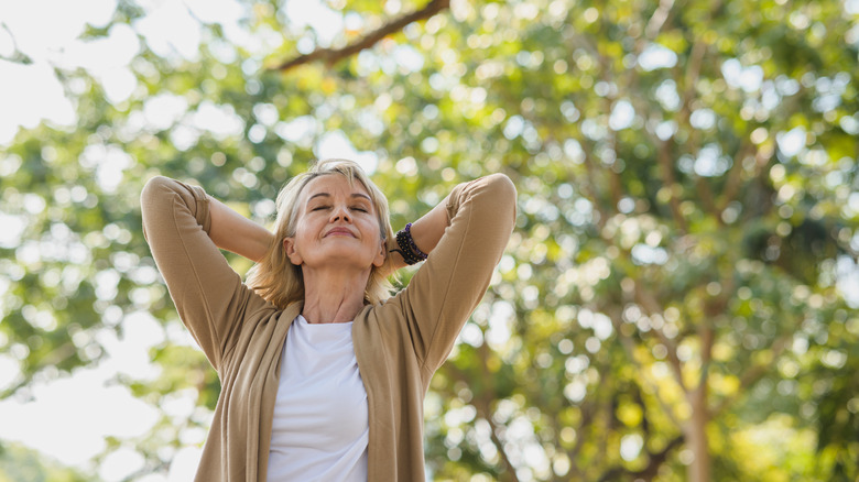 older woman happy outdoors 