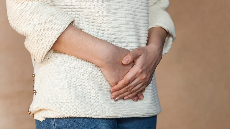 woman with bladder pain