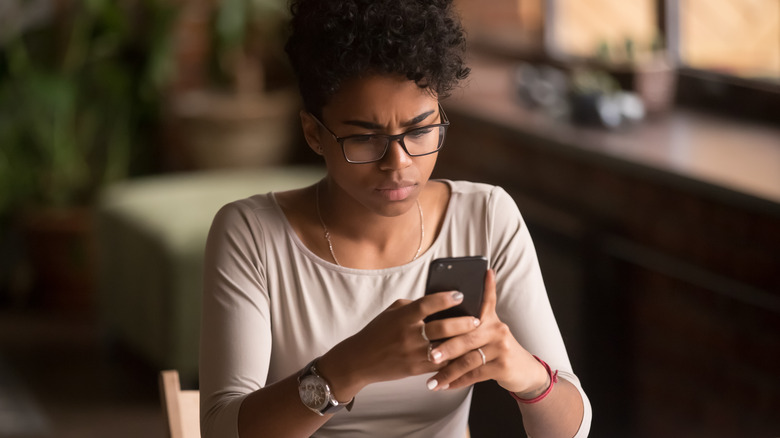 woman using cell phone