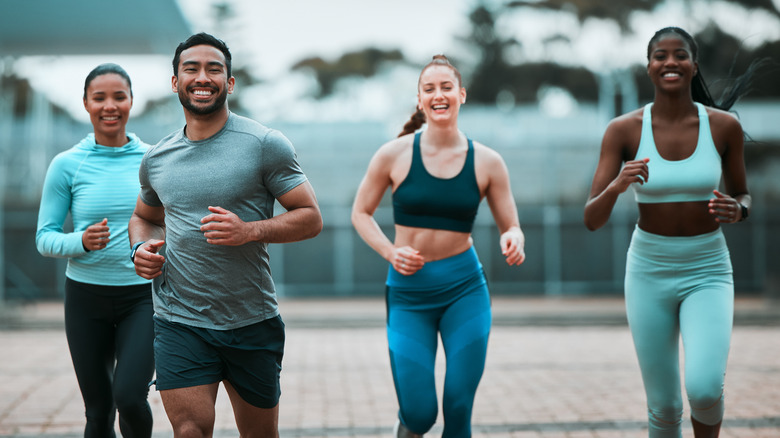 group of people running outside