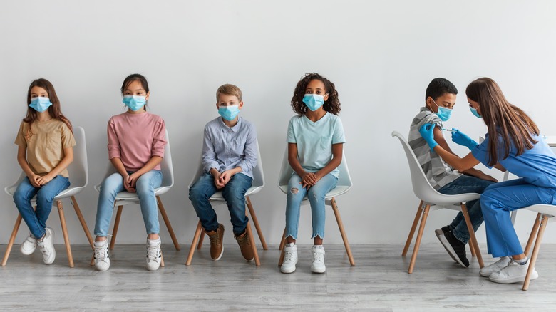 Children in line to get vaccinated