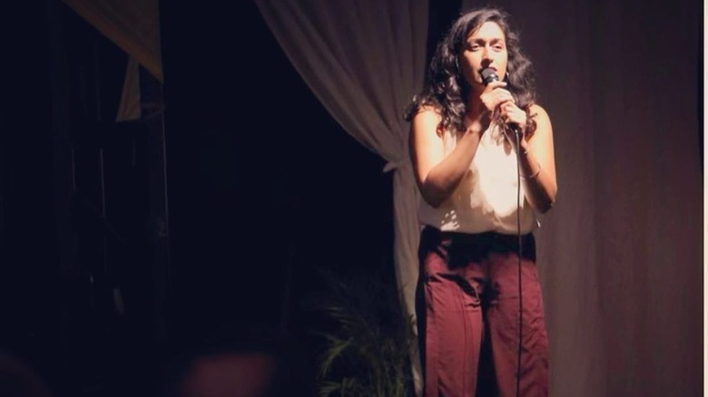 Priyanka onstage performing stand up routine