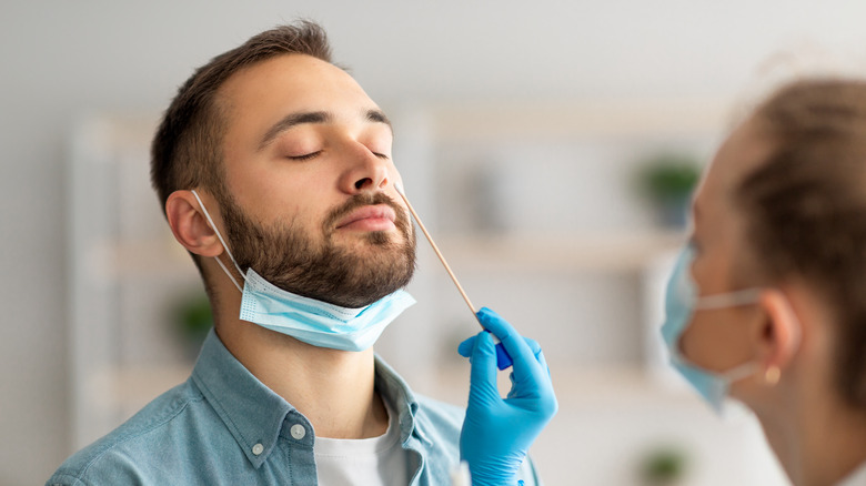 man getting a covid test