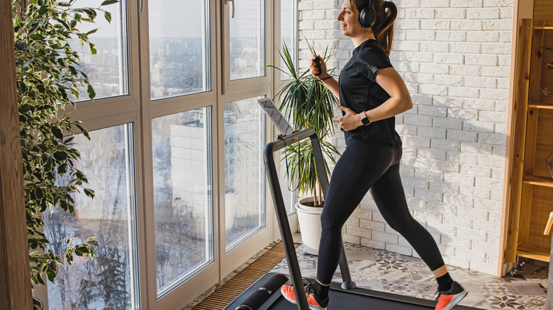 Woman walking on a treadmill