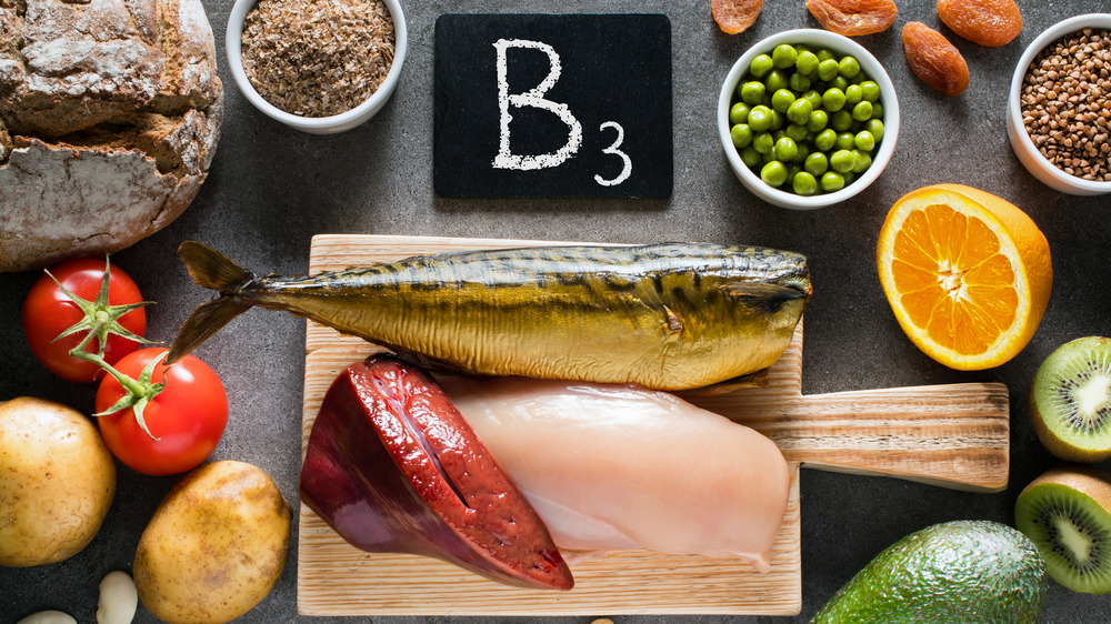 B3 next to fish, chicken peas, and other foods