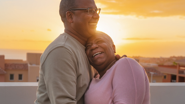 older couple embracing each other