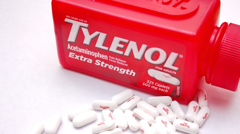 Tylenol pills with red bottle