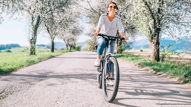 woman riding bike outside