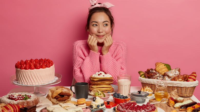 Woman with sugary foods