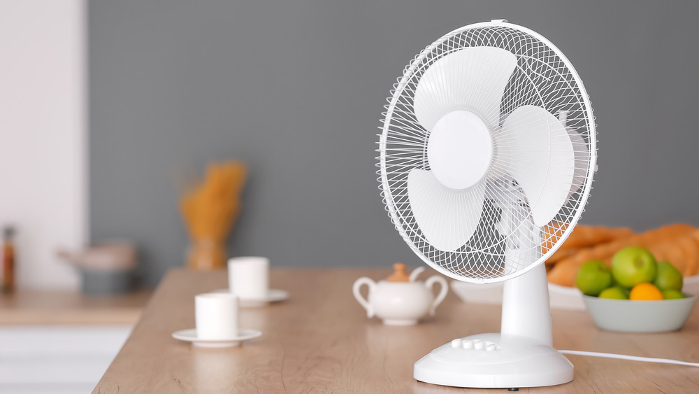 Portable fan on a table