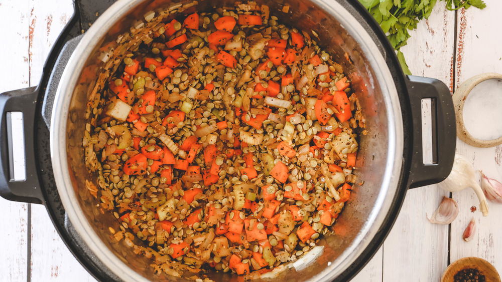 vegetables and lentils in pot