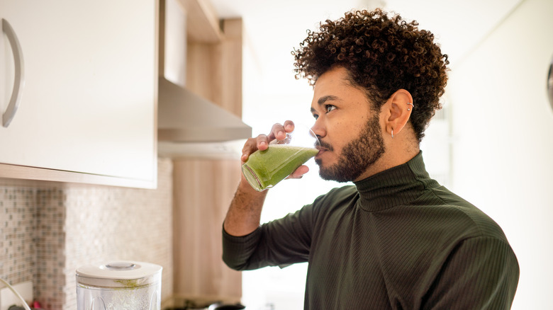 Man drinking morning juice