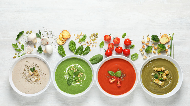 four different types of vegetable soups