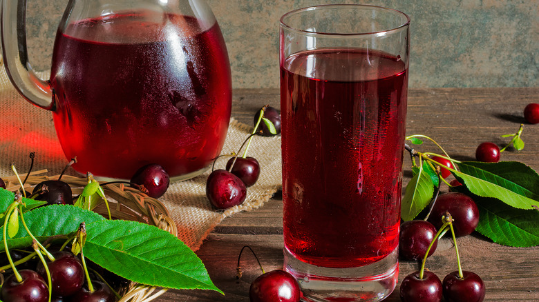 Pitcher and glass of cherry juice