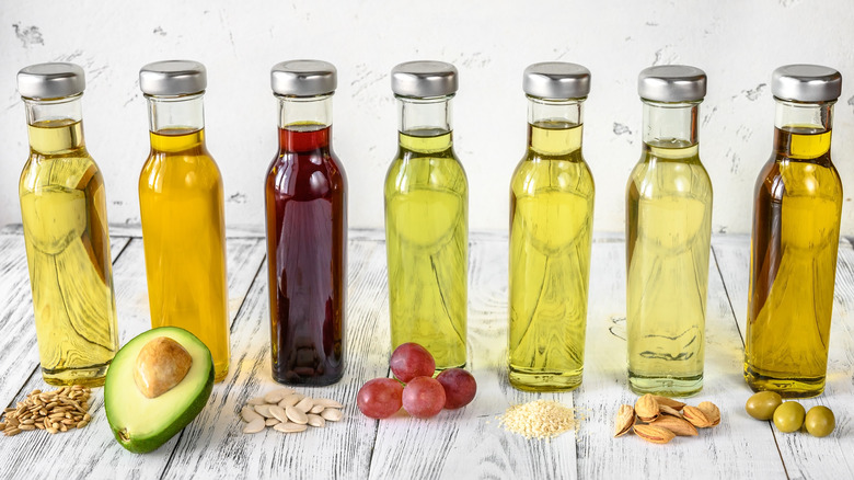 An assortment of different oils in bottles