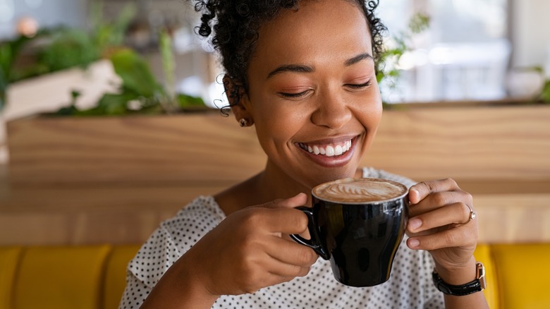 woman drinking coffee