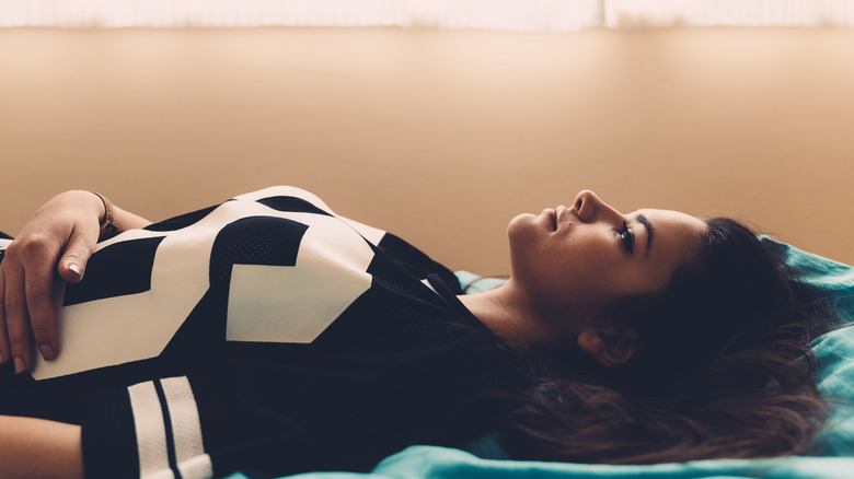 Woman lying in bed 