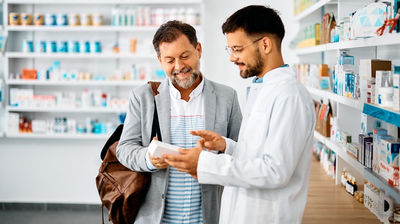 pharmacist with patient