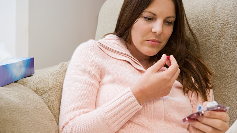 Woman with cough drop