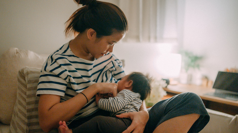 parent breastfeeding infant