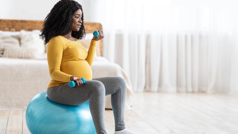 Pregnant woman exercising