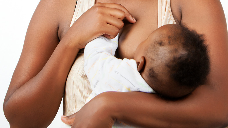 Woman breastfeeding a baby